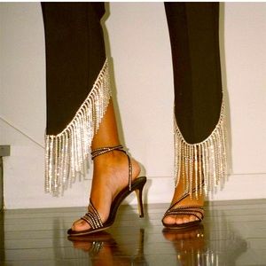 Black leggings with bling fringe. Super cute and fun! New with tags!